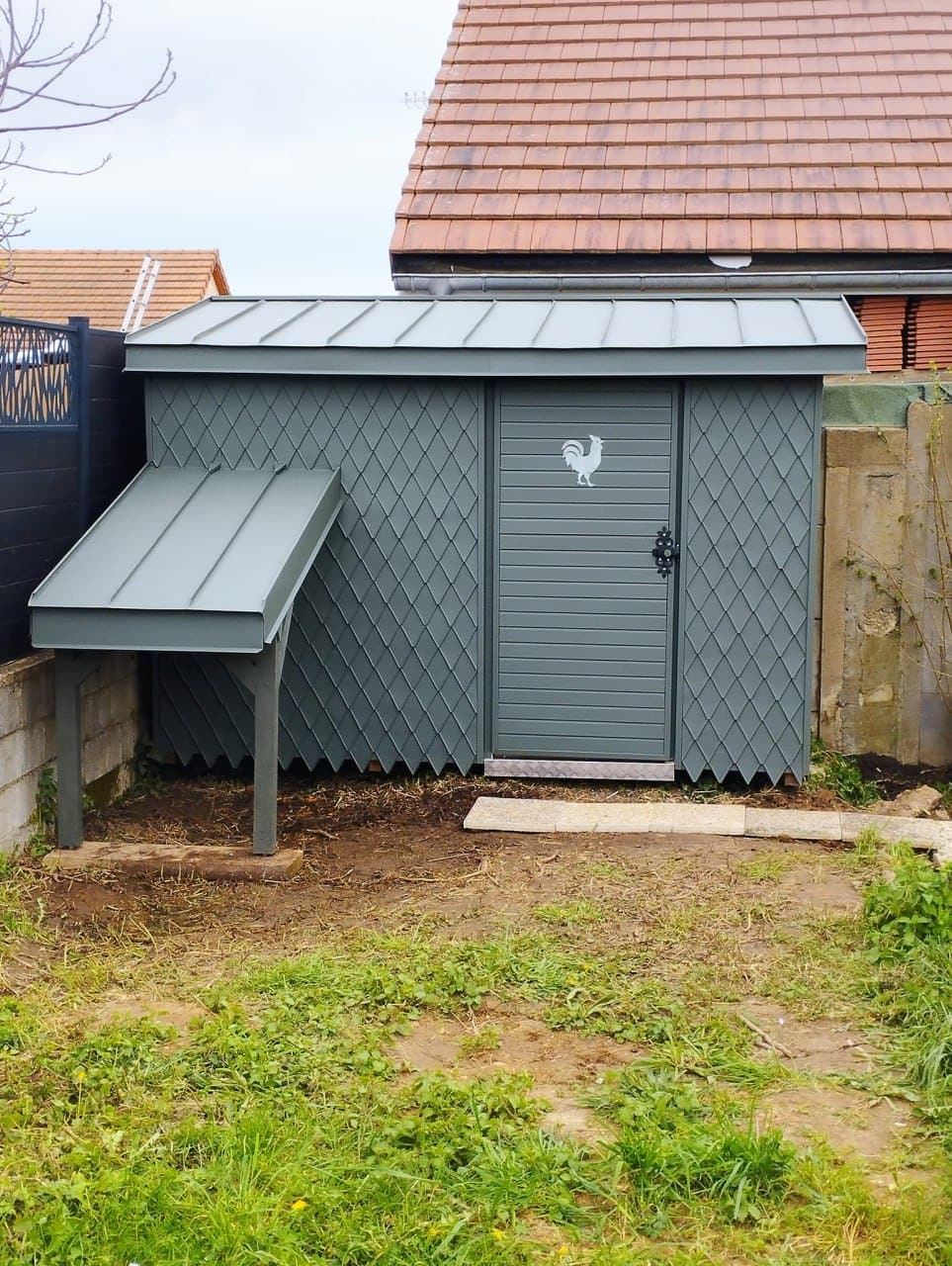 Another Chicken Coop with Metal Roof and Metal Shingle Wall Spengler